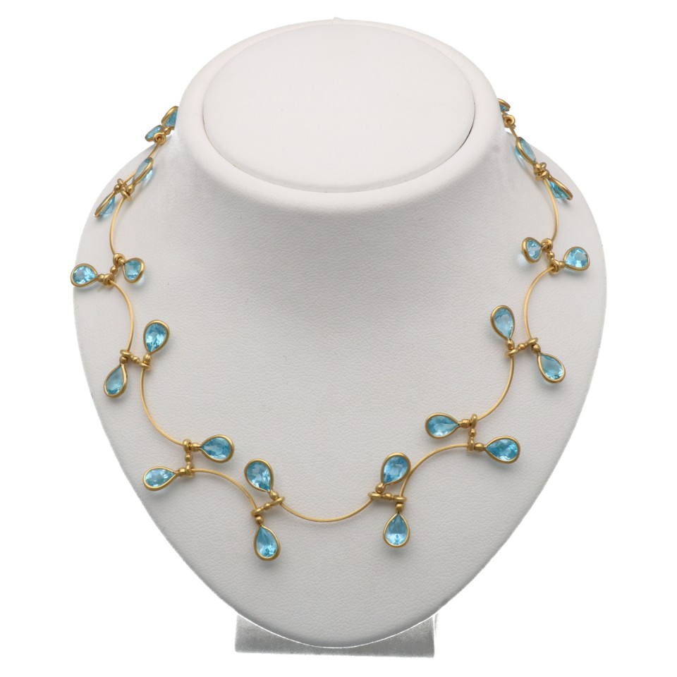 Handgemaakt collier 18 krt goud met Topaas