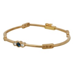 14Krt. gouden armband gezet met blauwe saffier en Briljant 0.20Ct.