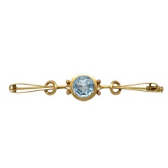 Gouden vintage broche met blauwe topaas