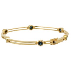 Geel gouden armband bezet met blauwe saffier, 14 krt goud.