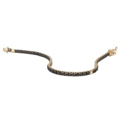 Geelgouden Tennisarmband met Zwarte diamanten.