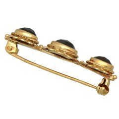 14 Krt vintage broche met granaten.