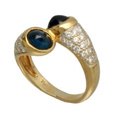 18 Krt. geelgouden slagring met briljant-blauwe saffier